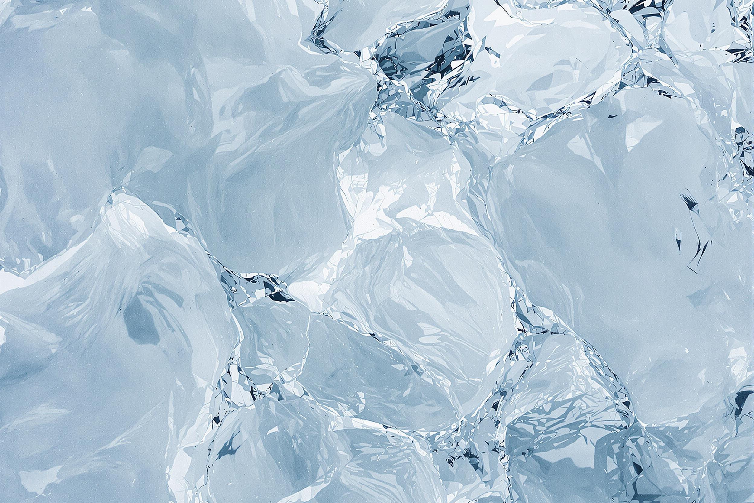 Discover the ephemeral beauty of nature's abstract art in this captivating photograph of melting ice. Delicate patterns and swirling textures create a mesmerizing composition, showcasing the interplay of light, water, and transient forms.