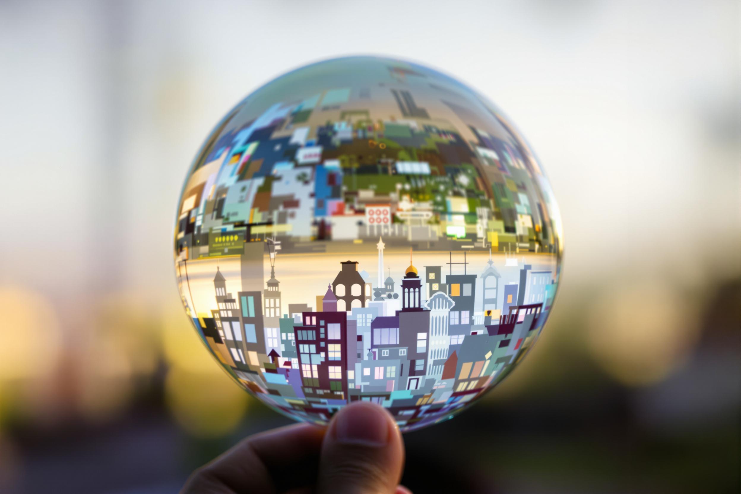 Discover the enchanting world of bubble refraction photography. This experimental image captures a miniature cityscape refracted through a delicate soap bubble, showcasing the interplay of light, perspective, and surface tension.