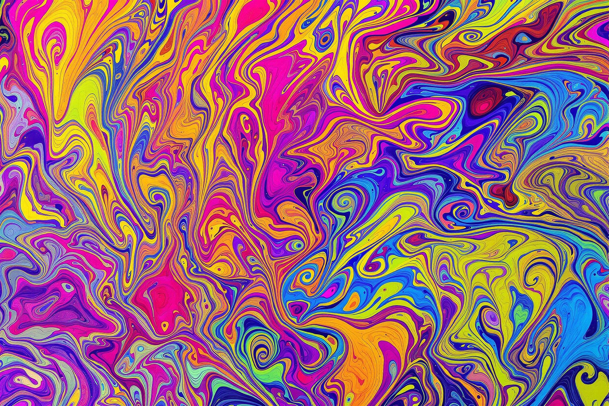 Discover the mesmerizing world of experimental fluid dynamics through an innovative marbling technique. This captivating image showcases swirling patterns of vibrant pigments suspended in a viscous medium, creating a hypnotic interplay of color and motion.