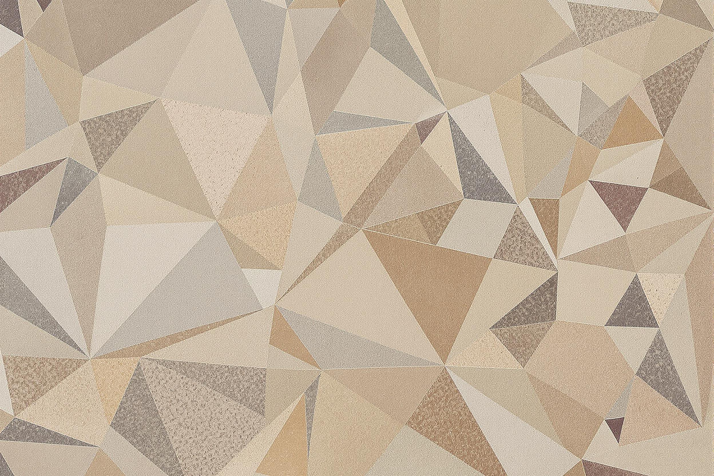 Explore the beauty of intricate geometric patterns found on natural stone surfaces. This image captures the unique textures and colors of the stone, showcasing a harmonious blend of earthy tones and sharp lines. Perfect for design inspiration and texture studies.